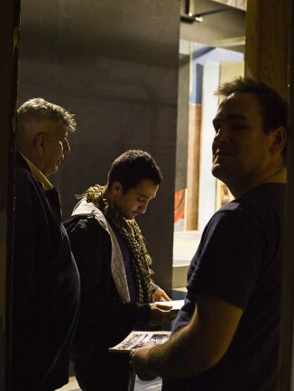 In the shadows...beyond the view of Salieri & Mozart...Citizens peruse the script!